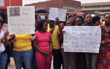 Daveyton residents protested outside the Benoni Magistrate’s Court on 12 March 2013, against the release of the nine policemen being accused of killing taxi driver Mido Macia. Picture: Govan Whittles/EWN