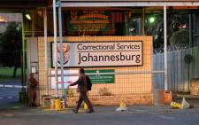 A correctional services official arrives for work at the Johannesburg Central Prison on Monday, 22 October 2012. Picture: Werner Beukes/SAPA