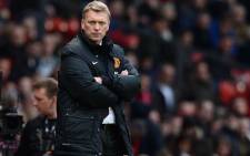 Manchester United manager David Moyes has come under fire after his team suffered a stinging home defeat by Swansea City on 5 January.Picture: AFP.