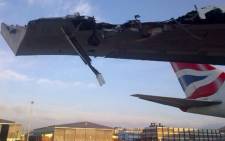 The British Airways Boeing 747 wing after it hit into a building at OR Tambo International Airport on 22 December 2013. Picture: iWitness.