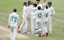 FILE: Proteas players celebrate the fall of a wicket. Picture: CSA/Twitter
