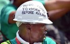 Amcu members have been on strike for higher wages since January. Picture: AFP.