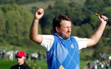 Europe Ryder Cup player Graeme McDowell celebrates on the 17th green after making the winning putt on 4 October 2010. Picture: Peter Muhly/AFP PHOTO