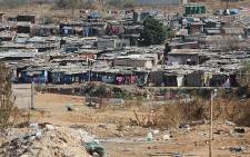 Shacks on the banks of the Jukskei River in Alexandra township - the likely alternative for women living in hostels. Picture: Taurai Maduna/EWN.