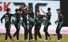 New Zealand's cricketers celebrate after dismissal of Pakistan's Shadab Khan (not pictured) during the third Twenty20 international cricket match between Pakistan and New Zealand at the Gaddafi Cricket Stadium in Lahore on early 18 April 2023. Picture: Arif ALI / AFP