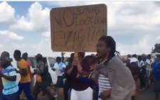 Protesting Kokotela residents on Sunday, 19 April 2020. They took to the streets over government's decision to evict them. Picture: Screenshot