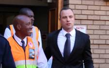 Oscar Pistorius leaves the High Court in Pretoria after his murder trial on 12 May 2014. Picture: Christa Eybers/EWN.