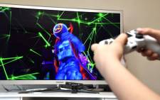 A gamer plays Fortnite featuring Travis Scott Presents: Astronomical on 23 April 2020 in Los Angeles, United States. Picture: AFP
