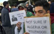 FILE: Algerian students demonstrate in the centre of the capital Algiers on 12 March 2019, one day after President Abdelaziz Bouteflika announced his withdrawal from a bid to win another term in office and postponed an 18 April election, following weeks of protests against his candidacy. Picture: AFP