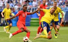 England's forward Raheem Sterling (L) vies with Sweden's defender Andreas Granqvist during the Russia 2018 World Cup quarter-final football match between Sweden and England. Picture: AFP