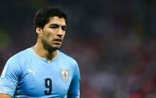 Uruguay striker Luis Suarez has been banned from all football-related activity for four months. Picture: Facebook.com