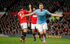 Edin Dzeko celebrates his goal during the English Premier League match against rival Manchester United at Old Trafford on 25 March 2014. Picture: Facebook.