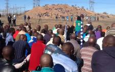 Lonmin miners gather ahead of one year anniversary at Lonmin's Marikana mine where 34 striking platinum workers were shot dead by police on 16 August 2012. Picture: Gia Nocolaides/EWN
