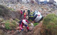 A man has been injured after crashing his vehicle off a cliff on Victoria Road in Camps Bay on 13 July 2018. Picture: Twitter/@ER24EMS