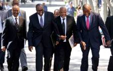 Finance Minister Nhlanhla Nene flanked by SARS Commissioner Tom Moyane, Deputy Minister of Finance Mncebisi Jonas, and DG Lungile Fuzile after his first Budget Speech in Cape Town on 25 February 2015. Picture: GCIS.