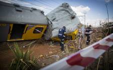 Two carriages, crushed in the impact when two commuter Metro Rail trains collided outside Tembisa. Picture: Thomas Holder/EWN