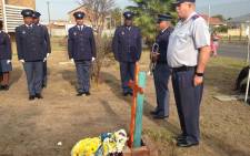 Police officers lay wreaths at the Ravensmead Police Station in honour of Constable Christopher Mouton. Picture: Lauren Isaacs/EWN