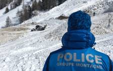 FILE: This handout picture released on 21 March 2018 by the Swiss Police shows search at the site of an avalanche. Picture: AFP.