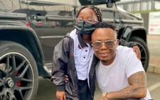 Dj Tira and his daughter on her first day at school. Picture: @DJTira/Twitter
