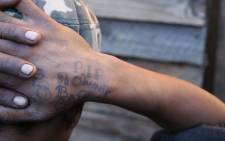 An eighteen year old alleged Bad Boys gang members tattooed hand. Picture: Bertram Malgas 