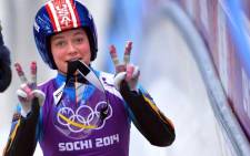 RUSSIAN FEDERATION, Rosa Khutor : US Kate Hansen gestures during a Women Luge training session at the Sanki Sliding Centre in Rosa Khutor on February 8, 2014, during the Sochi Winter Olympics. Picture: AFP.