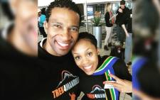 Renowned South African racing driver Gugu Zulu and his wife Letshego posing for a photo at the O.R. Tambo International Airport in Johannesburg on 13 July 2016 ahead of their trip to Tanzania. Picture: Facebook.