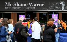 Members of the public wait to enter the Melbourne Cricket Ground (MCG) to attend the state memorial service for the former Australian cricketer Shane Warne in Melbourne on 30 March 2022. Warne died at a resort in Thailand on 4 March of a heart attack at the age of 52. Picture: William WEST/AFP