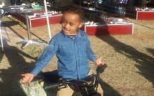 A four-year-old boy was killed after being dragged from his mother's car which was hijacked. Picture: Supplied.