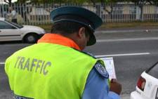 FILE: A Cape Town motorist is issued with a fine. Picture: Aletta Gardner/EWN