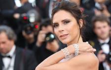 FILE: British fashion designer Victoria Beckham poses as she arrives on 11 May 2016 for the opening ceremony of the 69th Cannes Film Festival in Cannes, southern France. Picture: AFP.