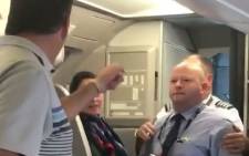 A passenger and an  American Airlines employee captured during an argument. Picture: screengrab via instagram.com