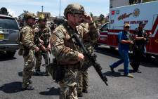 FILE: Law enforcement agencies respond to an active shooter at a Wal-Mart near Cielo Vista Mall in El Paso, Texas, Saturday, 3 August 2019. Picture: AFP
