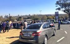 Hundreds of protesting Uber drivers have gathered in Sandton, planning to hand over a memorandum to management. Picture: Katleho Sekhotho/EWN.