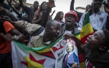 MDC supporters celebrate outside the MDC headquarters after what was earlier allegedly announced by their leadership as a win for the 2018 Zimbabwe elections. Picture: Thomas Holder/EWN