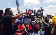 Black First, Land First leader Andile Mngxitama addressing Orange Farm residents. Picture: @Mngxitama/Twitter.