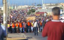 FILE: Hundreds of people marched in Hermanus for land and housing on 16 May 2018. Picture: @REDANTS_CT/Twitter