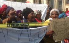 A group of pensioners protest outside Parliament demanding restitution for homes that were demolished during the apartheid era on 3 September, 2014. Picture: Lauren Isaacs/EWN.