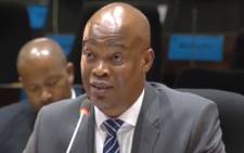 A screengrab of former executive head of IT at the Public Investment Corporation Luyanda Ntuane testifying at the PIC inquiry on 5 March 2019.