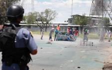 Protesters in Zamdela township in Sasolburg had a stand-off with the police on Tuesday 22 January 2013. Picture: Sebabatso Mosamo/EWN
