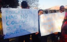 FILE. Police used rubber bullets to disperse angry parents outside a Roodepoort Primary School on 18 August 2015. Picture: Ziyanda Ngcobo/EWN. 
