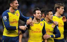 Arsenal's Santi Carzola (C) is flanked by Olivier Giroud (R) and Alexis Sanchez (R) after an impressive game against Man City on 18 January 2015. The Gunners won 2-0. Picture: Official Arsenal Facbook