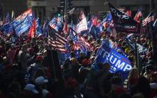 FILE: Supporters of former US President Donald Trump rally in Washington, DC, on 14 November 2020. Supporters are backing Trump's claim that the 3 November election was fraudulent. Picture: AFP. 
