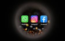 This picture taken in Moscow on 5 October 2021 shows the US instant messaging software Whatsapp's logo, the US social network Instagram's logo, and the US online social media and social networking service Facebook's logo on a smartphone screen. Picture: Kirill KUDRYAVTSEV/AFP