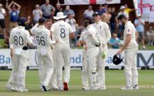 England's Dominic Bess (3rdR) celebrates with teammates after the dismissal of South Africa's Anrich Nortje during the fifth day of the third Test cricket match between South Africa and England at the St George's Park Cricket Ground in Port Elizabeth on 20 January 2020. Picture: AFP