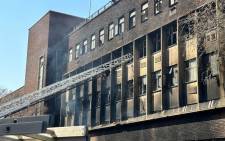 A fire engine is seen extinguishing a fire at a building in Marshalltown in the Johannesburg CBD on 31 August 2023. Picture: @GautengHealth/X