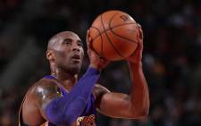 FILE: Los Angeles Lakers #24 Kobe Bryant takes a shot during free play. Picture: AFP