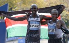 FILE: Wilson Kipsang of Kenya (L) is congratulated by compatriot Geoffrey Mutai after winning the men's 2014 TCS New York City Marathon 2 November 2014 in New York. Picture: AFP