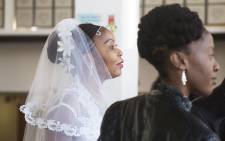 A bride waits to say 'I do' during the mass wedding ceremony at Robben Island on Valentine's Day. Picture: Cindy Archillies/EWN