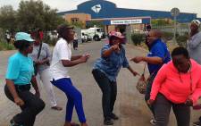 FILE: Women sing and dance outside the Tshwane Mail Centre in Pretoria on 15 October 2014. Picture: Vumani Mkhize/EWN.