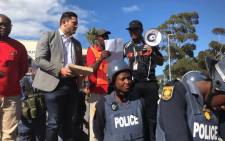 Community members from Imizamo Yethu handed over a memorandum of grievances to City of Cape Town officials during a protest on 26 March 2018. Picture: Monique Mortlock/EWN.